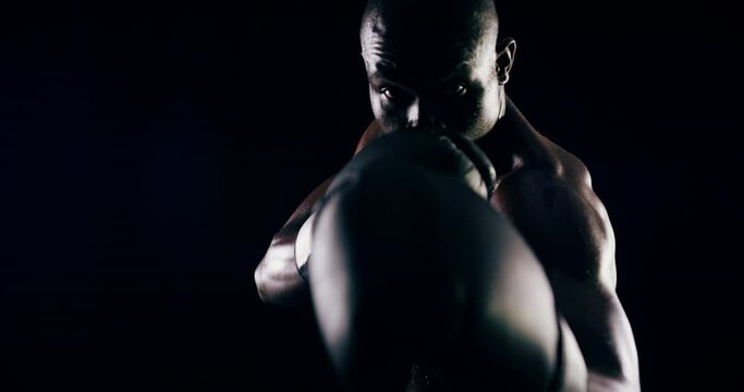 Face of athlete, sports or African boxer boxing for fitness, punch power or wellness on black background. Come here, fighter or strong man in studio for workout, combat training or fighting exercise