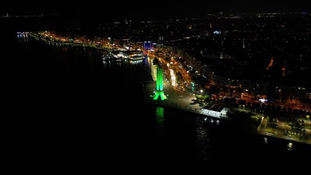 izmir karsiyaka district, sea and ferries and traffic n aerial view with drone on a sunny day. High quality 4k footage