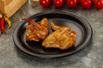Tasty roasted chicken wing with spices
