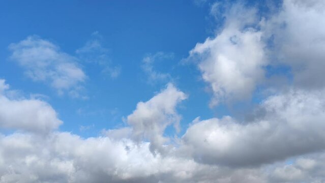 Beautiful landscape of white cumulus clouds circulating through the blue sky