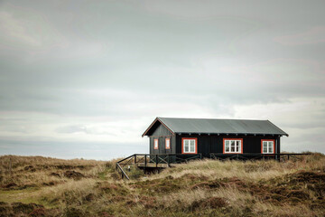 Holzhaus in den Dünen