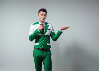 A man expresses emotions, points with finger, stylish suit. 