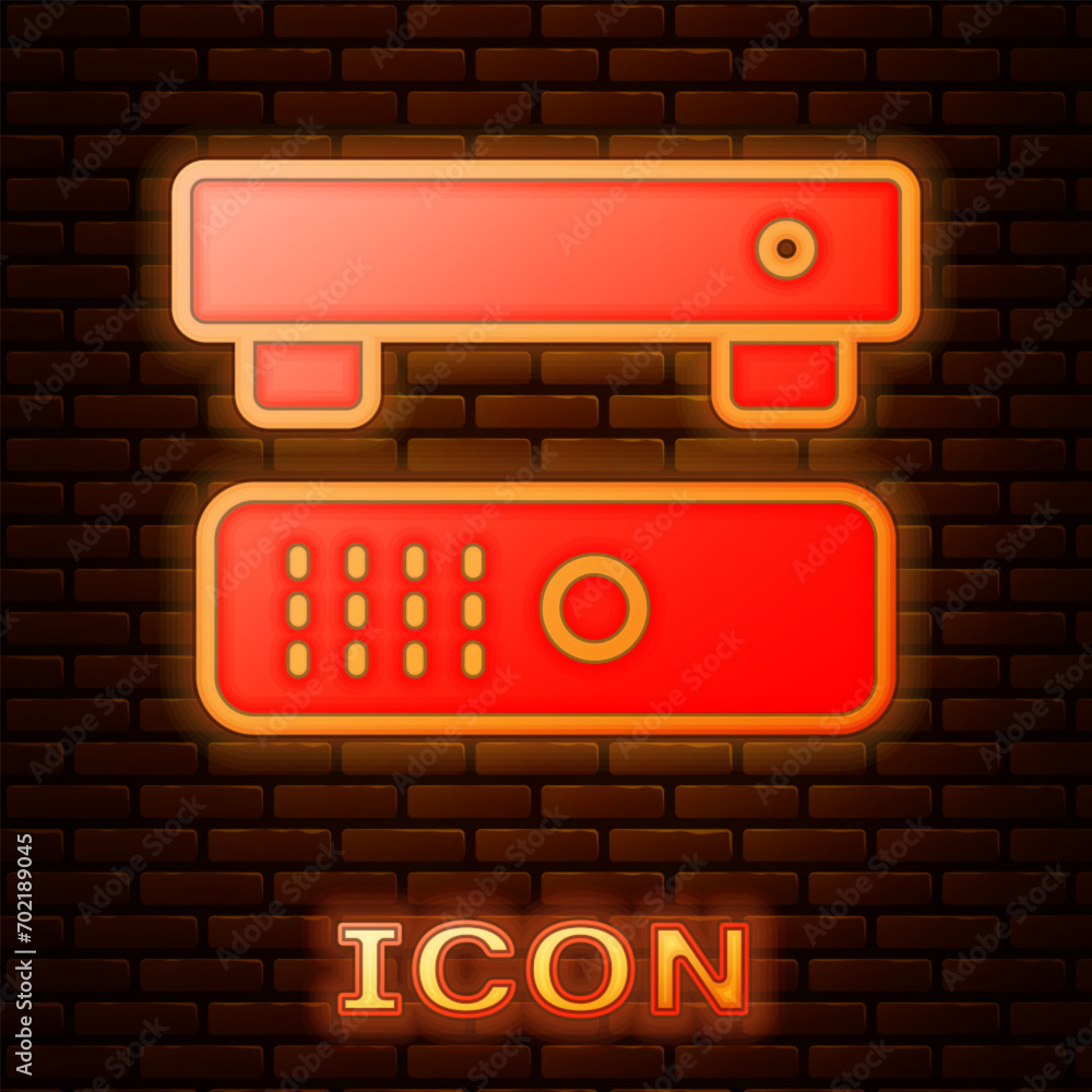 Poster glowing neon multimedia and tv box receiver and player with remote controller icon isolated on brick