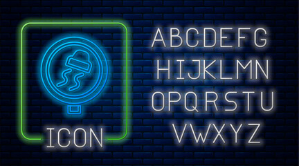 Glowing neon Slippery road traffic warning icon isolated on brick wall background. Traffic rules and safe driving. Neon light alphabet. Vector