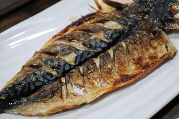 Korean food. Grilled mackerel on a plate