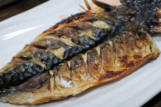 Korean food. Grilled mackerel on a plate