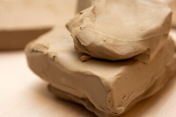 a piece of clay on a light background, for making clay products