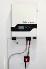 Solar Inverter on Wall. Hybrid Inverter as Home Battery Energy Storage located in the Wall. Lithium...