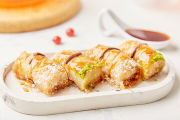 Close up of traditional honey baklava - turkish dessert. Natural sweets close up