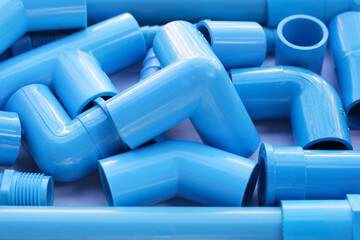 Blue pvc pipe connections for plumbing work. Plumber equipment