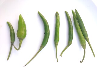 Green chillies are shown as a sample with  white backgrounds giving a great view.