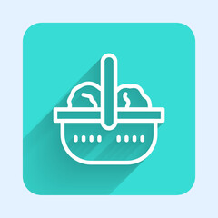 White line Shopping basket and food icon isolated with long shadow background. Food store, supermarket. Green square button. Vector