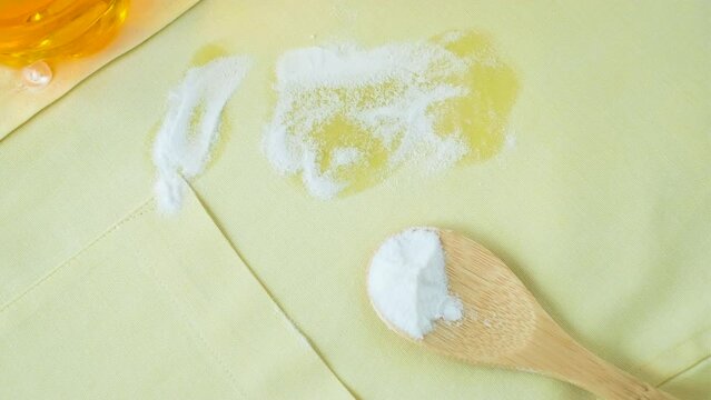 Grease stains in a clothes. Eco-friendly remove of stains on clothes. daily life stain concept. High quality 4k footage
