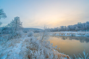 Bring to life a magical winter wonderland. Witness the breathtaking beauty of the frozen river at sunrise. Immerse yourself in a whimsical winter adventure Immerse yourself in the magic of Frozen Dawn