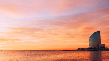 Obraz premium Sunrise on San Sebastian Beach Barcelona Spain