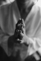 Engagement ring on bride's finger.