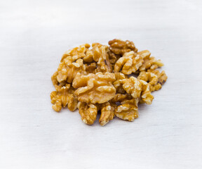 Walnuts, Juglans. dried fruits for happy
Tu Bishvat.
Healthy natural food with lots of minerals and vitamins. On a white background wooden texture. with free space for text
