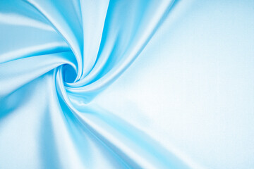Abstract background luxury blue cloth or liquid wave or wavy folds of grunge silk texture satin.