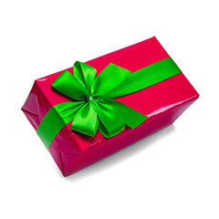 Gift wrapped in red paper with green bow, with transparent background and shadow