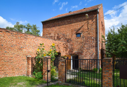 Tower and defensive wall in the north-eastern corner of the old town, remains of medieval city fortifications, Ketrzyn (ger. Rastenburg), Warmian-Masurian Voivodeship, Poland.
