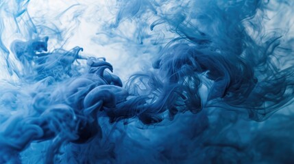 Fototapeta na wymiar Swirling Blue Ink in Water