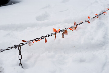 chain link fence entrance to the parking lot.