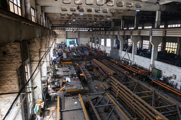 Kyiv, Ukraine - 15.06.2022: Various metal structures cut in the workshop. The factory produces metal parts, elements, and structures. Plant for the production of metal structures. - 702244817