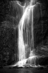 Cascade of Zillhausen near Balingen, south Germany. “Bütttenbach“ creek waterfall surrounded...