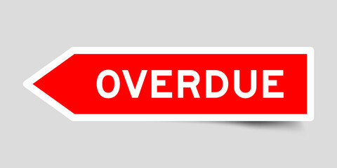Red color arrow shape sticker label with word overdue on gray background