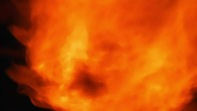 A close-up rotation of a fiery engine with fuel explosions