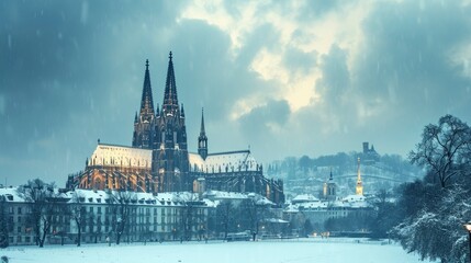 A grandiose cathedral standing tall amidst a winter storm, its spires piercing the snowy clouds, creating a majestic and awe-inspiring winter architectural scene - obrazy, fototapety, plakaty