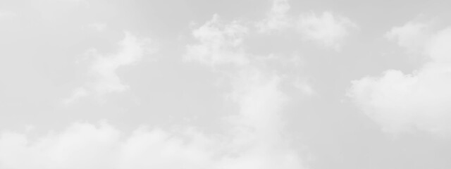 	White cloud in the sky. View on a soft white fluffy cloud as background. Cloudy sky, white clouds, black background pattern. The gray cloud trendy photo. White sky image	