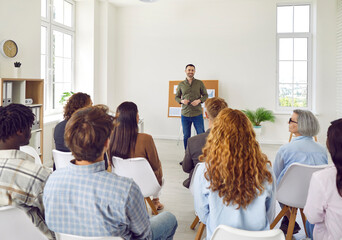 Employees attending corporate business training or seminar. Professional business coach speaking...