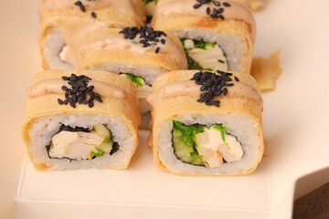 Assorted sushi nigiri and maki big set on slate. A variety of Japanese sushi with tuna, crab, salmon, eel and rolls. Top view