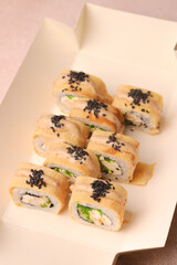 Assorted sushi nigiri and maki big set on slate. A variety of Japanese sushi with tuna, crab, salmon, eel and rolls. Top view