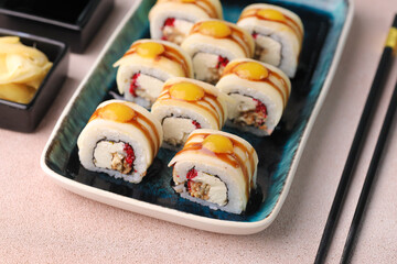 Assorted sushi nigiri and maki big set on slate. A variety of Japanese sushi with tuna, crab, salmon, eel and rolls. Top view