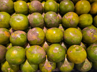 Indonesian Jeruk Oranges for sale in a market.