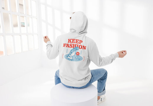 Mockup of man wearing customizable hoodie, rear view