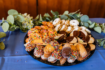 platter of italian bakery sprinkle cookies on a platter on table at catered brunch