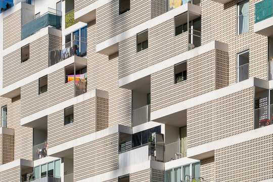 Detail of the white facade of a modern apartment building in the city of Madrid in Spain