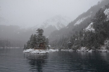 Snowy Cabin and Mountainside