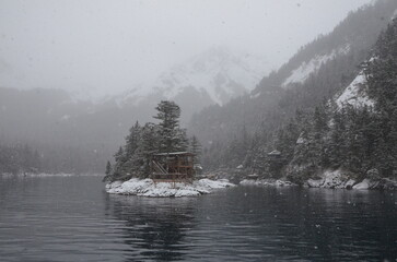 Snowy Cabin and Mountainside