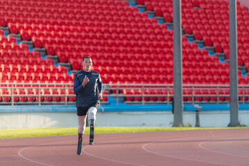Athletes with disabilities who utilize running blades for short distances. Run down the running track.