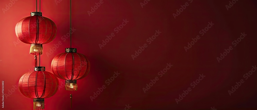 Poster a red wall with three red lanterns hanging from it's sides and a red wall with three red lanterns ha
