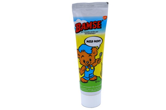 Toothpaste tube f&ouml;r kids. With the Swedish cartoon bear Bamse. White background.