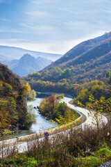 Fototapeta na wymiar Autumn landmark with Debed river and foggy mountains, Armenia