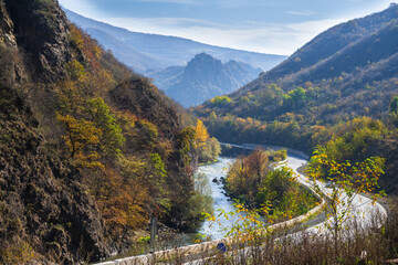 Autumn landmark with Debed river and foggy mountains, Armenia