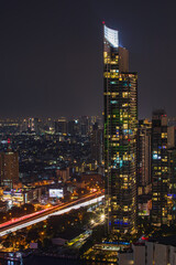 Beautiful cityscape Bangkok river boat business district and residential. In the twilight,