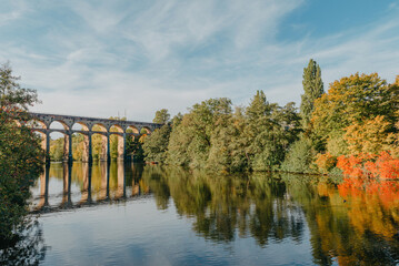 Railway Bridge with river in Bietigheim-Bissingen, Germany. Autumn. Railway viaduct over the Enz...