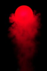 Abstract magical glowing ball of red color on a black background